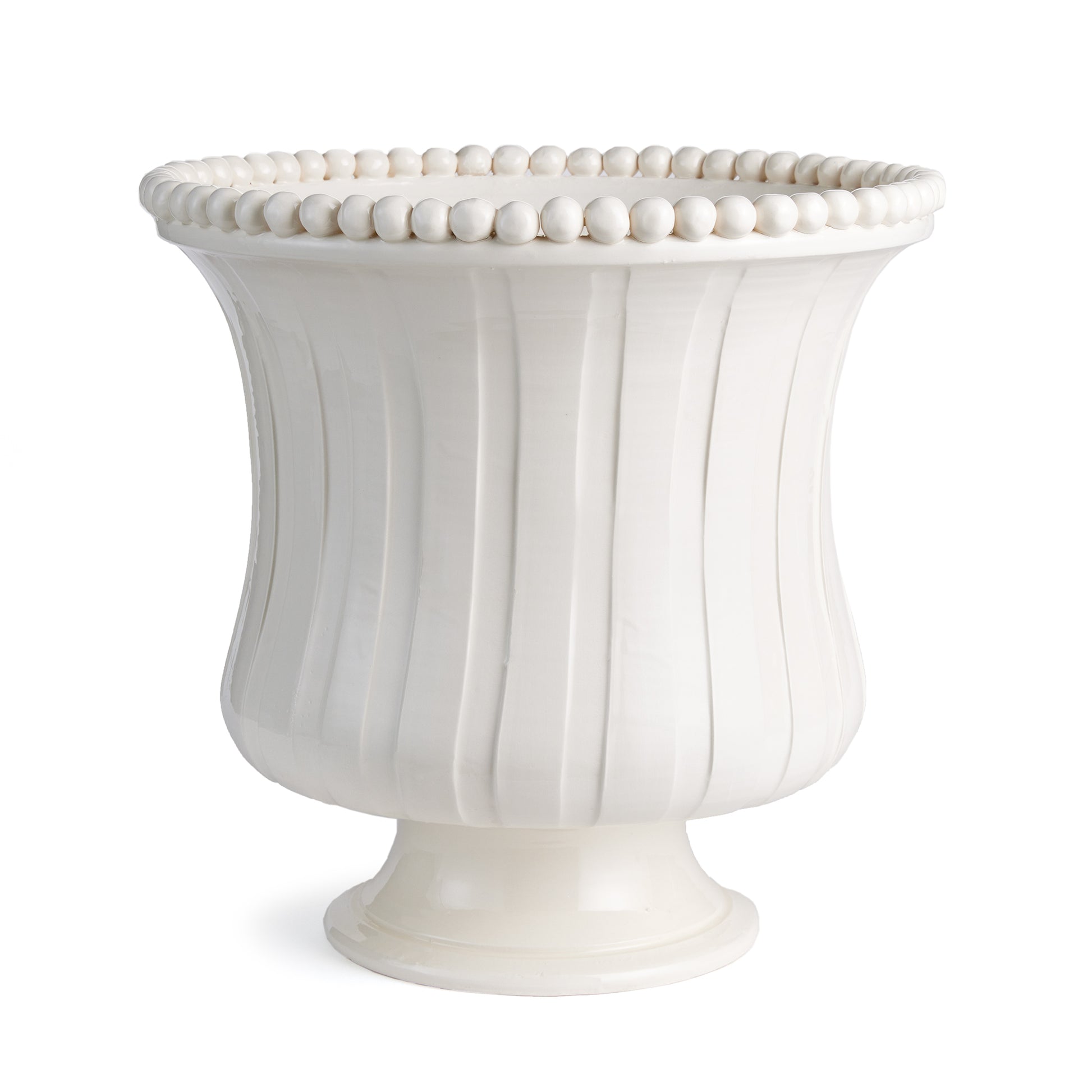 The Coletta Grande Flared Vase is handmade by Italian artisans in Tuscany, Italy. The subtle ribbing and hand-applied beading are made with genuine attention to detail. With a classic Italian craftsmanship passed down through generations, each piece is a true original.