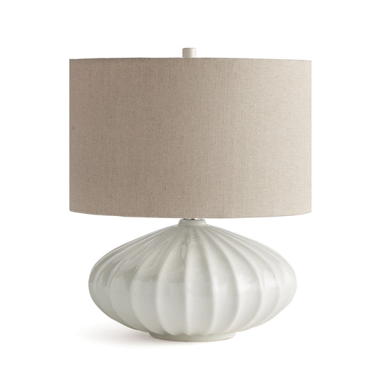 In stunning detail, a curvy ceramic Base is the defining feature of this gorgeous lamp. The sweeping design and grand scale make it a solid focal point in the transitional space.