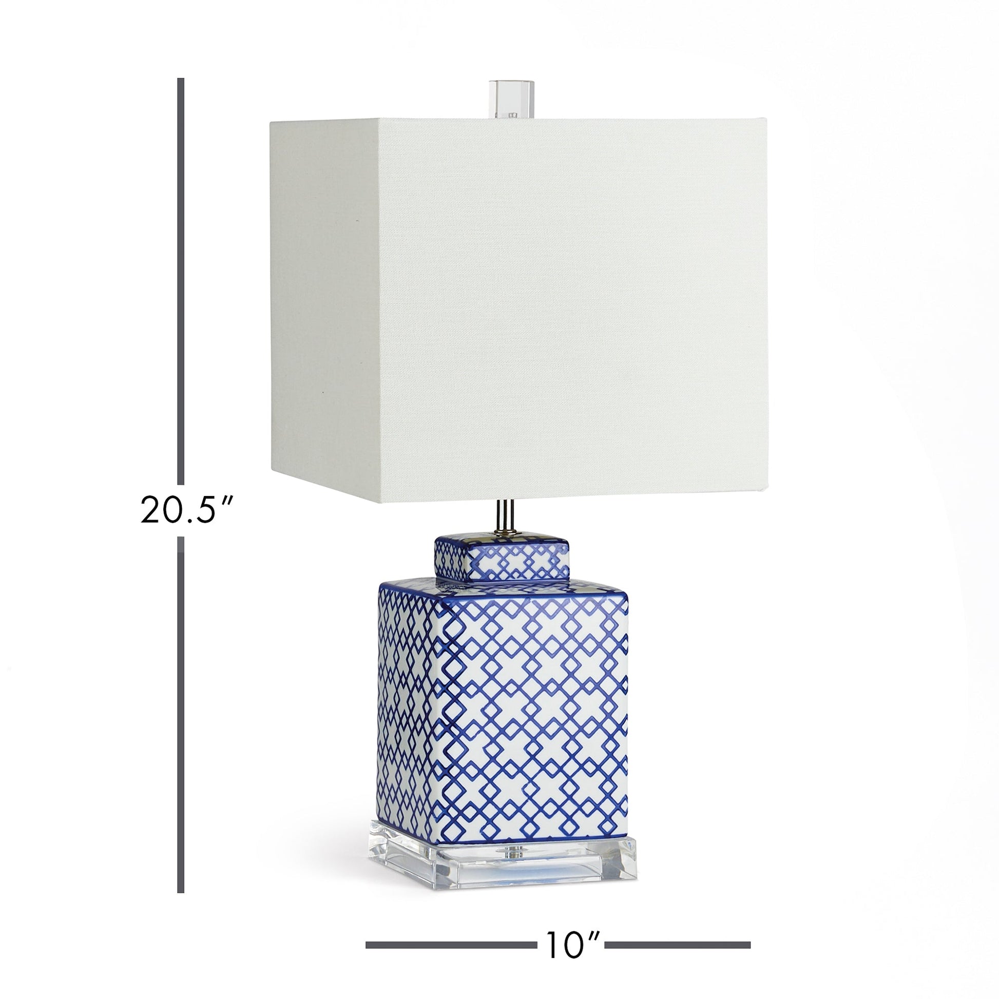 This table lamp boasts a striking square shape and bold pattern, making it a sophisticated addition to any living area. Whether placed on a side table, console, or shelf, it offers a stunning way to add light to the room. Crafted with an acrylic stand, ceramic base, and linen shade, it is the perfect choice for your living room.