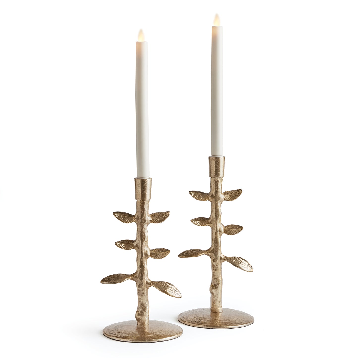 In a heavy cast aluminum, these nature-inspired taper holders sprout up from the surface in a loose, sculpted style. A whimsical way to elevate your candles.