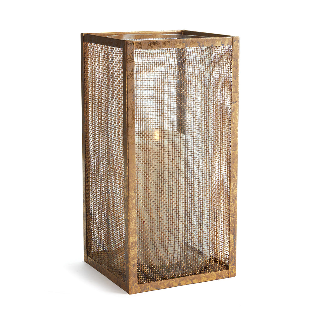 Diego is architectural in design. A light-catching mesh screen in antique gold adds a hint of drama. Complete with glass vases, not hurricanes so as to hold fresh florals as well as candles.