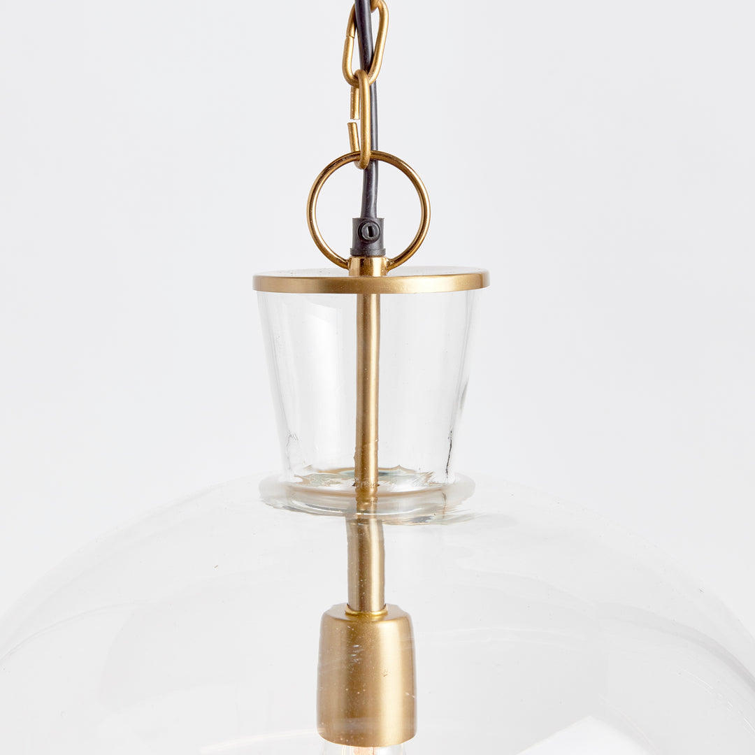 A classic mix of warm brass and seeded glass in grand scale, this pendant is a traditional fixture. Over an island, in an entry or foyer, a beautiful fixture. Expertly designed and crafted, the Belle Glass Grande Island Pendant Light is the perfect addition to any home