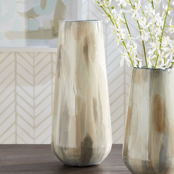 Experience the advantages of enameled iron with Almeta White Pearl Vase Large. These lightweight beauties are hand-painted, showcasing a stunning and elegant tone-on-tone design. Each vase is crafted with expert precision, ensuring a light and creamy appearance. Find beauty in simplicity with Almeta White Pearl Vase Large. Made of enameled iron, these hand-painted vases boast a stunning tone-on-tone design with expertly crafted precision. Enjoy lightweight and creamy perfection with every vase.