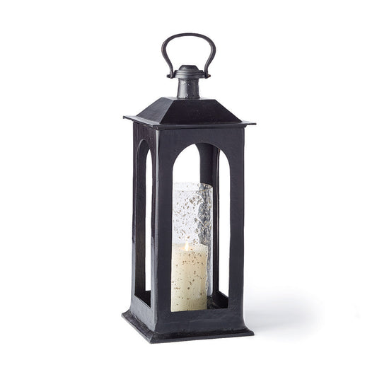 Enhance the ambiance of your space with this 25 inch Atherton Hurricane Lantern. Featuring a powder-coated finish and a seeded glass insert, this unique piece is perfect for any foyer or fireplace. Create a cozy atmosphere and warm up your space with its glowing light.