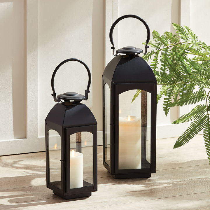 Experience the expert craftsmanship of the Antoinne Outdoor Black Lantern Small, exuding timeless elegance with a nod to classic European design. This chic lantern boasts a sophisticated aesthetic, complemented by a bold black tone that adds a touch of drama to any outdoor space. Crafted with high-quality faux zinc material, this lantern is built to last and elevate the style of your outdoor area with its professional and expertly crafted design.