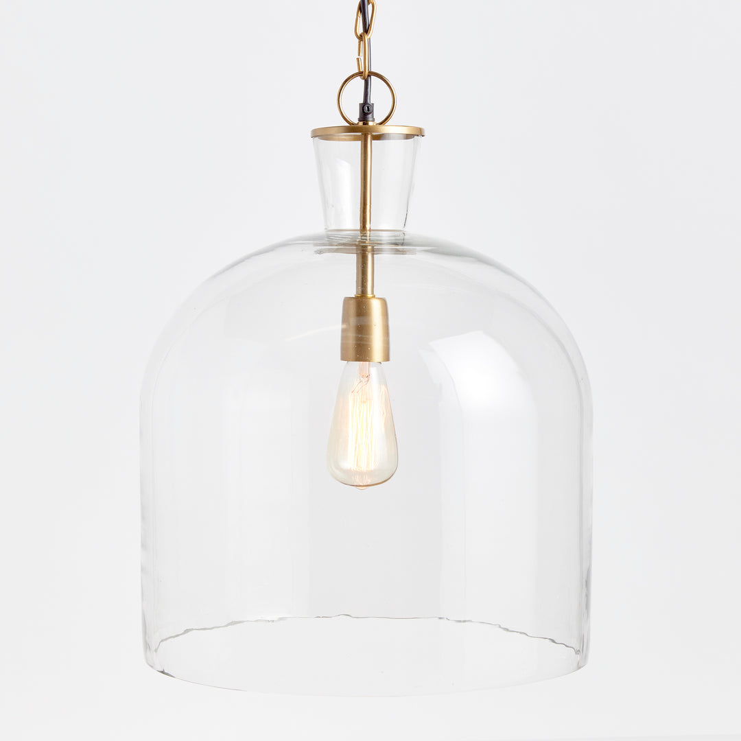 A classic mix of warm brass and seeded glass in grand scale, this pendant is a traditional fixture. Over an island, in an entry or foyer, a beautiful fixture. Expertly designed and crafted, the Belle Glass Grande Island Pendant Light is the perfect addition to any home