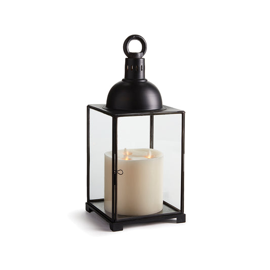 Light and structured in design, this lantern is most fitting a minimalist environment. With an extra wide Base, multiple candles may be used.