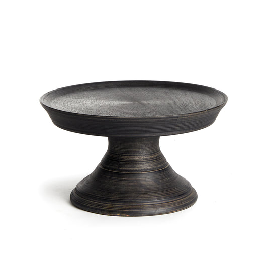 Looking to elevate your display? Made out of turned mango wood, and finished in a dark, matte wash this traditional stand is a work of art. Use on the kitchen island, or in the family room to create some variation in height and added interest to your accents.