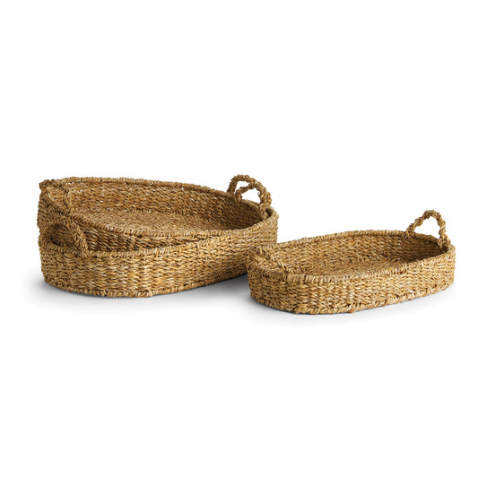 Our Seagrass is double-walled baskets that are supple, not stiff. They're beautiful in texture - just as nature intended. These oval trays with handles are no exception. Casually versatile in every way.