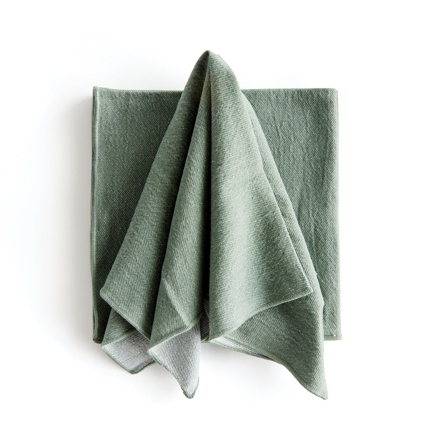 Bring a touch of softness to the table with this set of four cotton napkins. Beautiful in tone and texture, the verdant green is designed to add a pop of signature color to your tablescape.