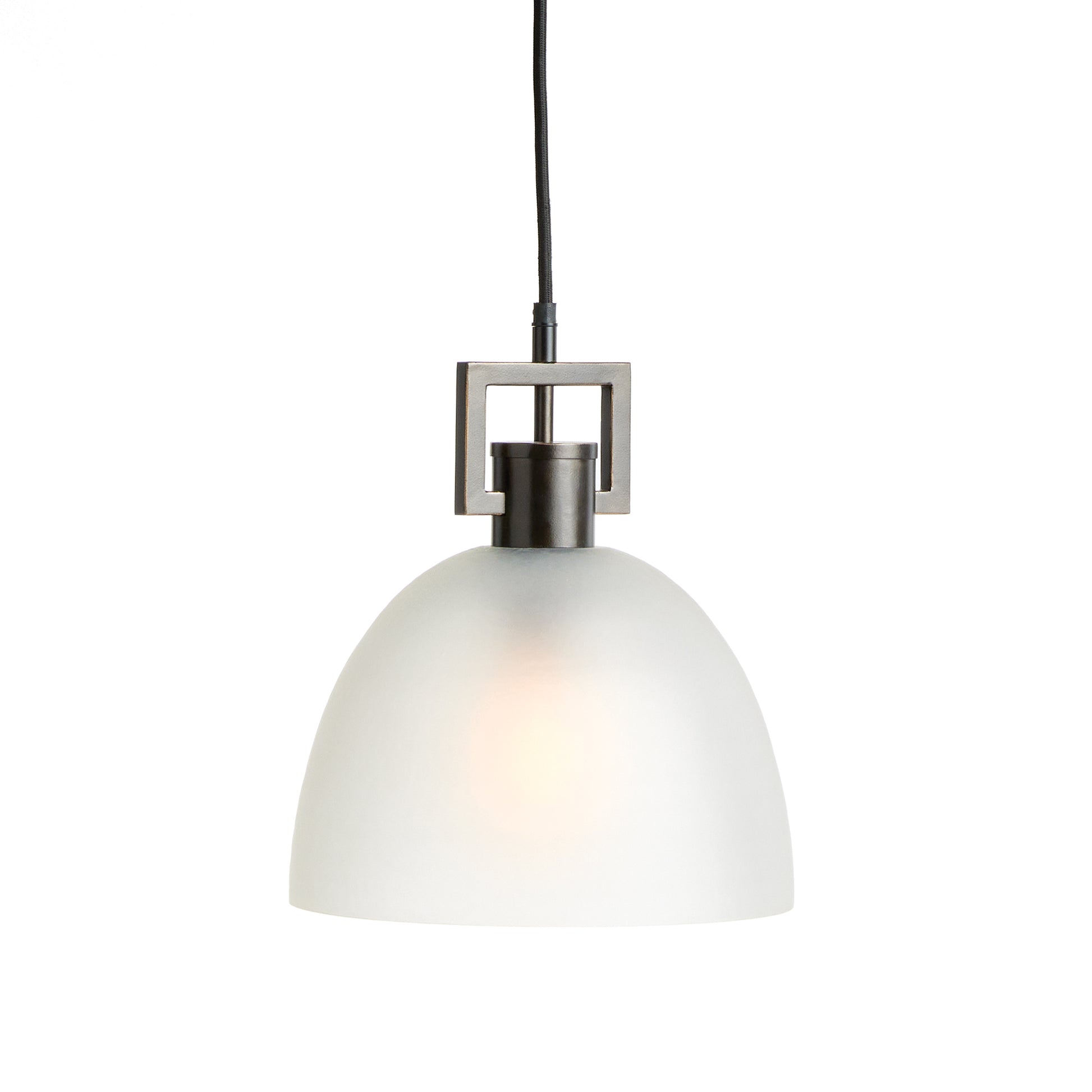 This antique bronze pendant light boasts a timeless design, with its warm finish and opaque matte glass providing a diffused light. Ideal for adding a touch of classic elegance, it can be hung over an island, in an entryway or foyer.