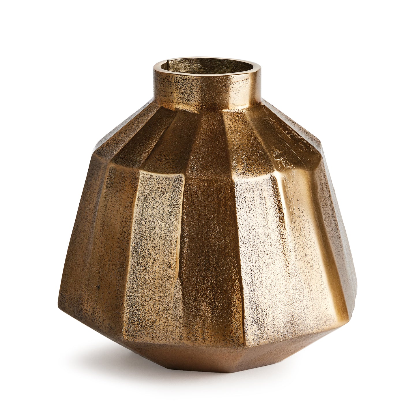 The warm metal finish and multifaceted profile makes this vase a standout piece. The Depth of tone and curved lines creates a beautiful accent for the modern space.