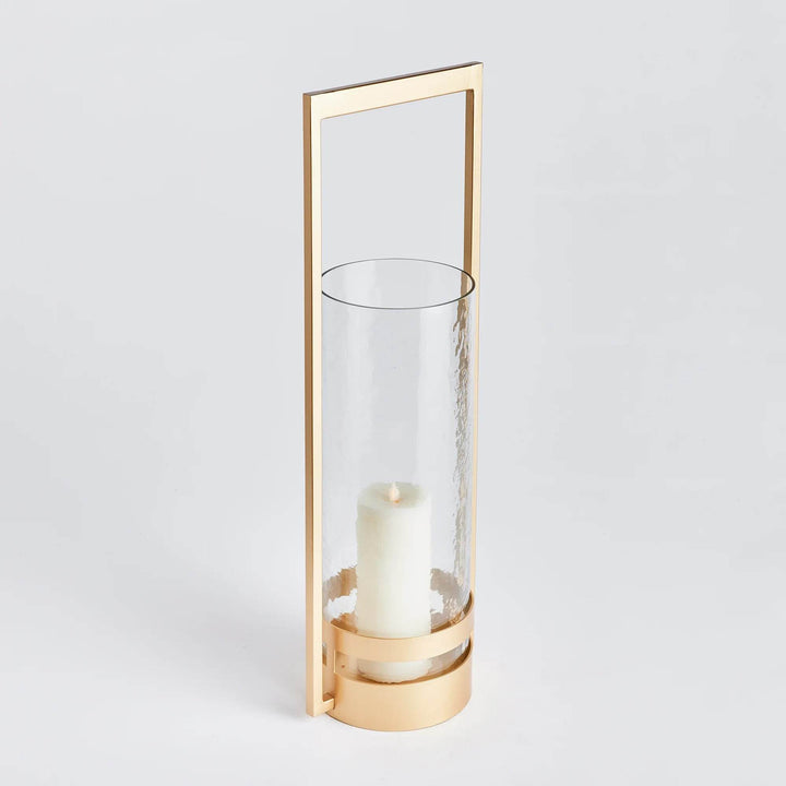 Experience the perfect balance of metal and glass with our Atrio Gold Hurricane Large. Merging expert craftsmanship and eye-catching design, this hurricane is a must-have for any modern, open space. Its warm gold finish and impressive size will leave a lasting impression.
