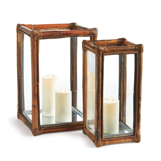 This set of two solid cane rattan hurricanes add a warm, natural vibe to your space. Add a couple of LED candles and feel the ambiance.