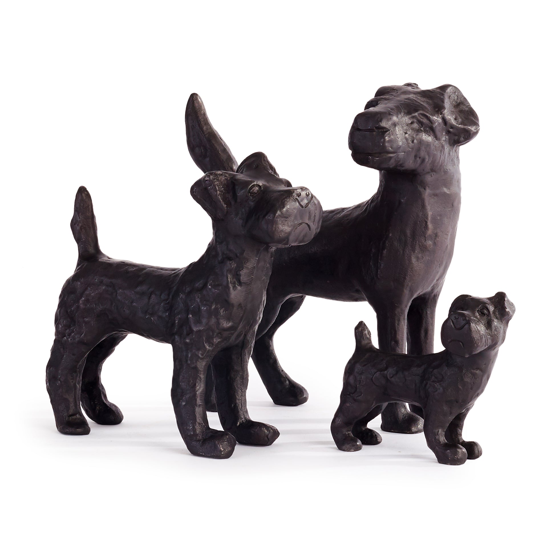 This set of three hounds stands alert, ready for a signal from their master. A regal accent for library, study or desk adding character and style.