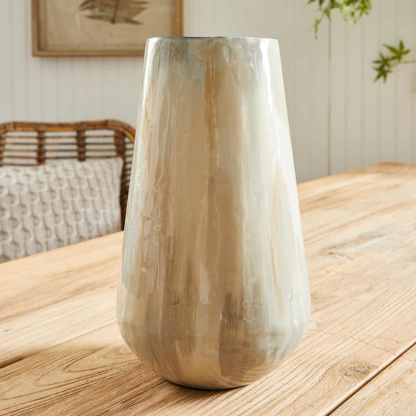 Using enameled iron in an innovative manner, these delicately crafted vases are hand-painted, each one featuring a charming tone-on-tone design. This technique produces a lovely light and creamy effect, making for a distinctive addition to any space. Crafted with expertise, Almeta White Pearl Vase Small stands out with its innovatively crafted enameled iron and charming tone-on-tone design. This unique technique produces an elegant, light and creamy effect that adds a distinctive touch to any room.