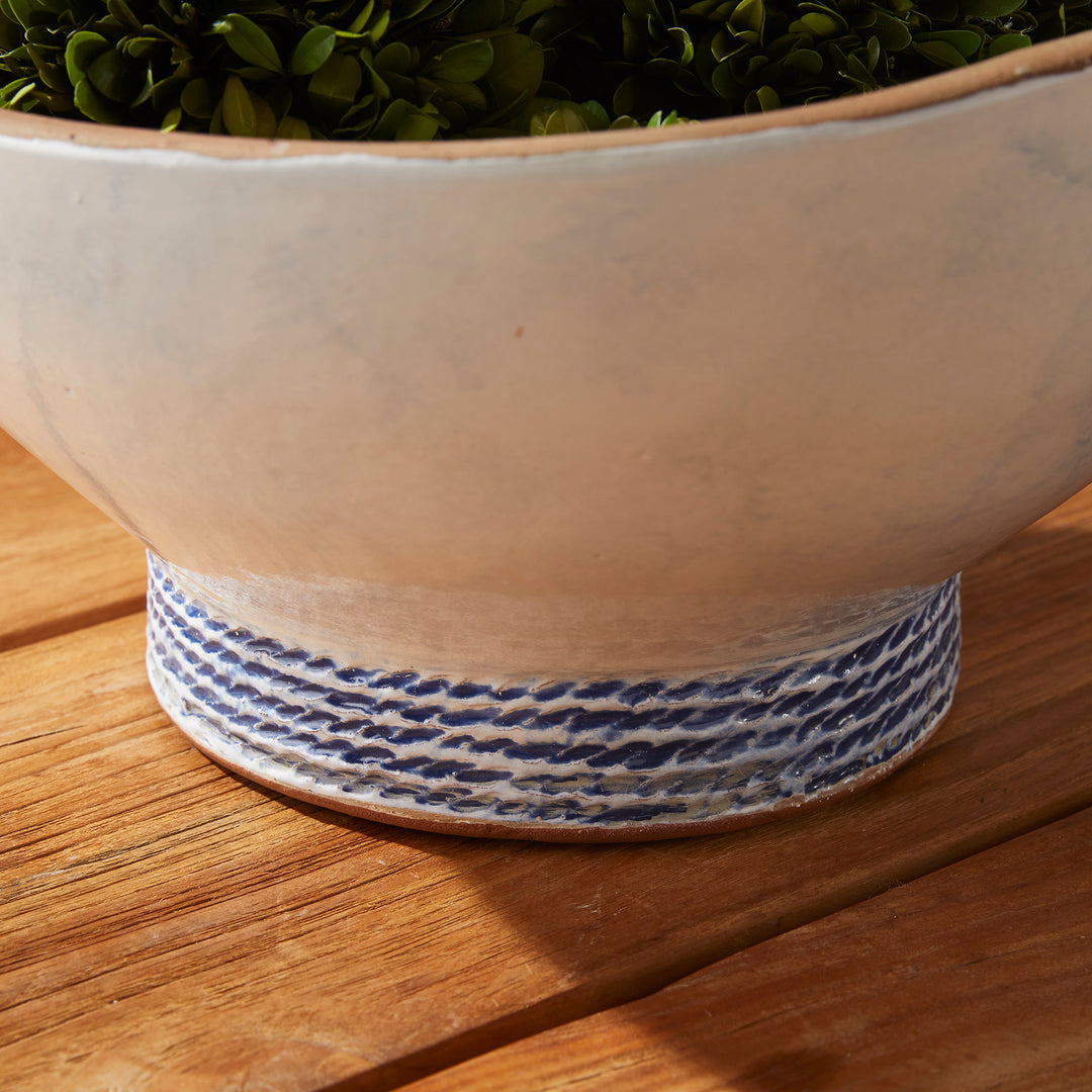 Our Coastal Themed Decorative Bowl features a Grecian blue striped design and exposed clay rim, evoking the beauty of the Mediterranean. The fully glazed interior adds a touch of luxury and elegance, making it a perfect addition to any coastal-themed decor. Whether used as a stunning centerpiece or to display fresh limes, this versatile bowl is sure to impress.