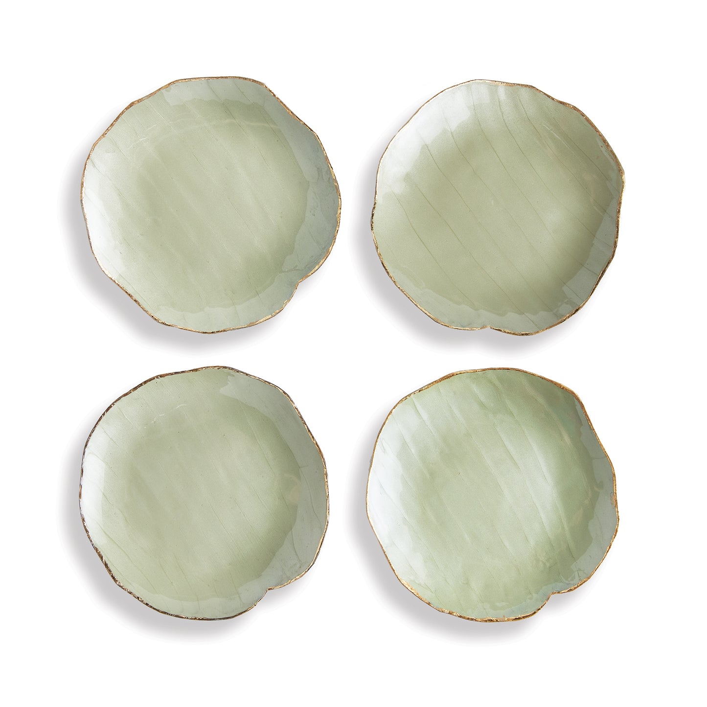 This charming set of hand-painted decorative trays are inspired by nature. With a gold edge detail, and muted green hues, they add a pop of colorful character to kitchen island, side table or ottoman.