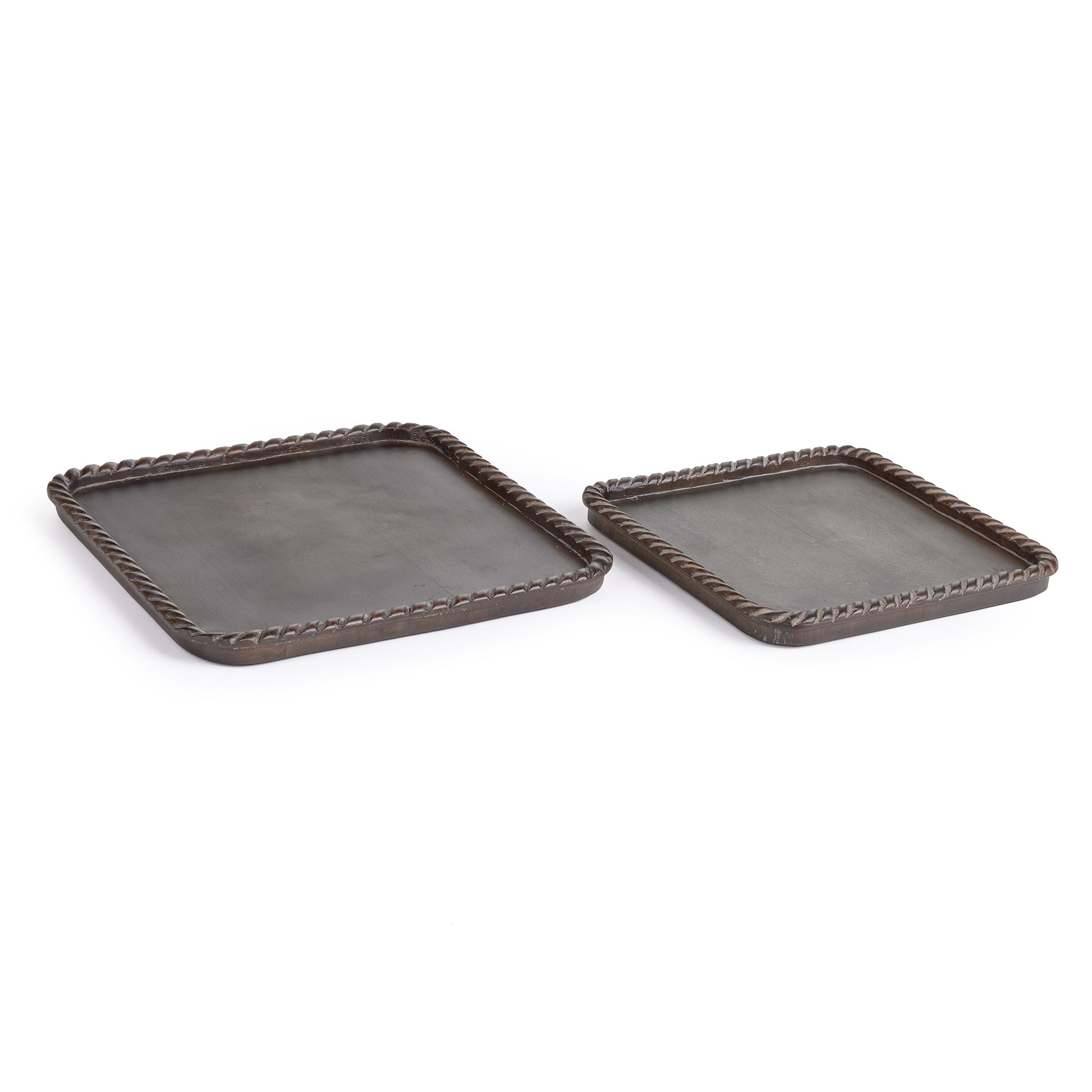 Hand carved from mango wood, this pair of trays is a sweet little accent for baked goods or a cheese tray. A little touch of natural wood tone is always on trend.