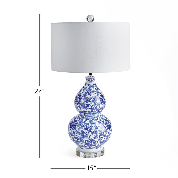 A classic yet elegant chinoiserie design, perfect for coastal-inspired spaces. This piece adds a touch of sophistication and brightness to any setting -whether on a side table, console, or shelf. Featuring a blue and white color scheme, a finial, and an acrylic base.