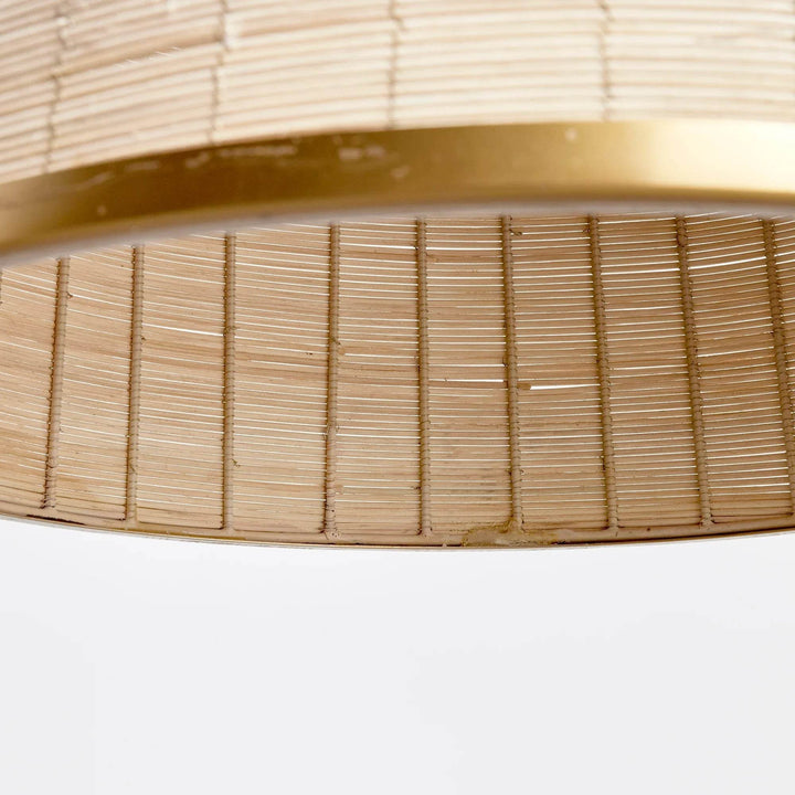 Woven in a natural cane rattan, with subtle variations in color making each one truly unique, this pendant is an instant classic. The brass details on the top and along the bottom rim make it decidedly more refined. And talk about scale! A show-stopping choice for kitchen island, entry foyer or hallway.