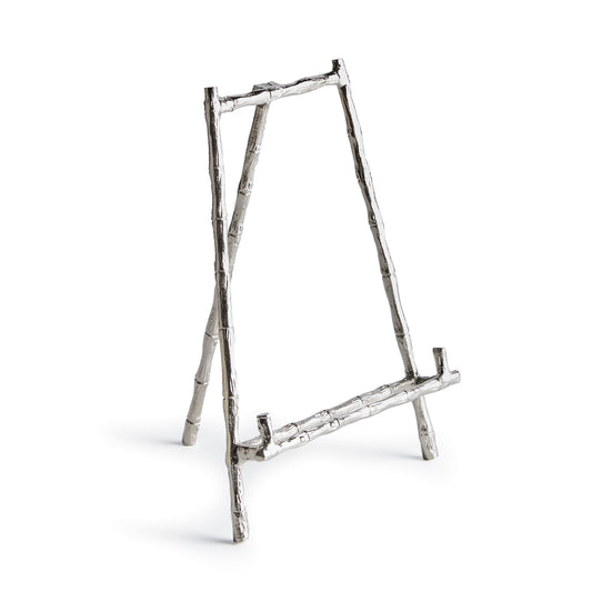 Expertly designed for a variety of uses, this silver easel provides a dependable and sturdy way to display platters, cookbooks, and small artworks. Its strong construction ensures the safety of your items, while the silver accents inspired by bamboo add a timeless touch to your presentation. A versatile and long-lasting choice for showcasing platters, cookbooks, or small artworks.