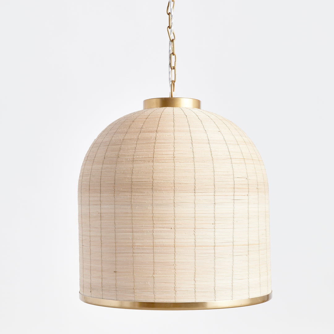 Crafted from natural cane rattan, the Maye Dome Pendant Light boasts a distinctive blend of colors, creating one-of-a-kind pieces. With elegant brass accents at the top and bottom, this pendant adds a refined touch to any space. Its impressive size makes it a statement piece for kitchen islands, entryways, or hallways, elevating the overall look of your room.