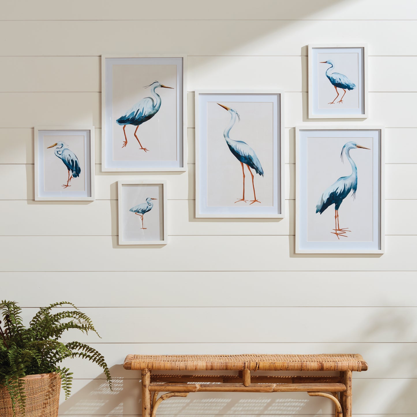 Enhance your home office or study with the calming beauty of these coastal-inspired prints, carefully curated and framed to create a striking display. This set of six is perfect for creating a stunning salon-style arrangement or brightening up smaller spaces. With its elegant white wood frames and serene design, this print set is a versatile and sophisticated choice for any space.