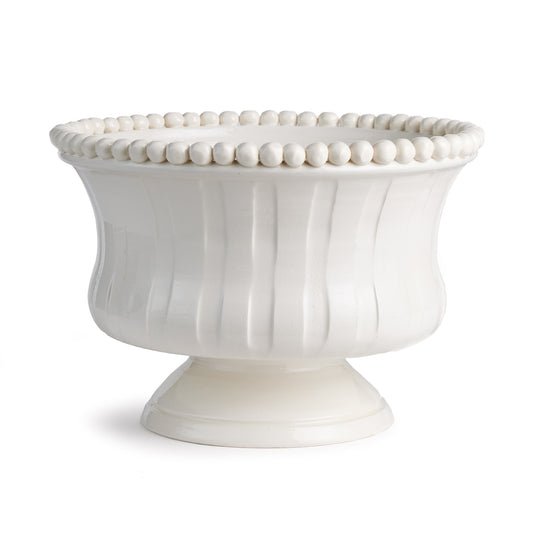 The Coletta Decorative Footed Bowl is handmade by Italian artisans in Tuscany, Italy. The subtle ribbing and hand-applied beading are made with genuine attention to detail. With a classic Italian craftsmanship passed down through generations, each piece is a true original.