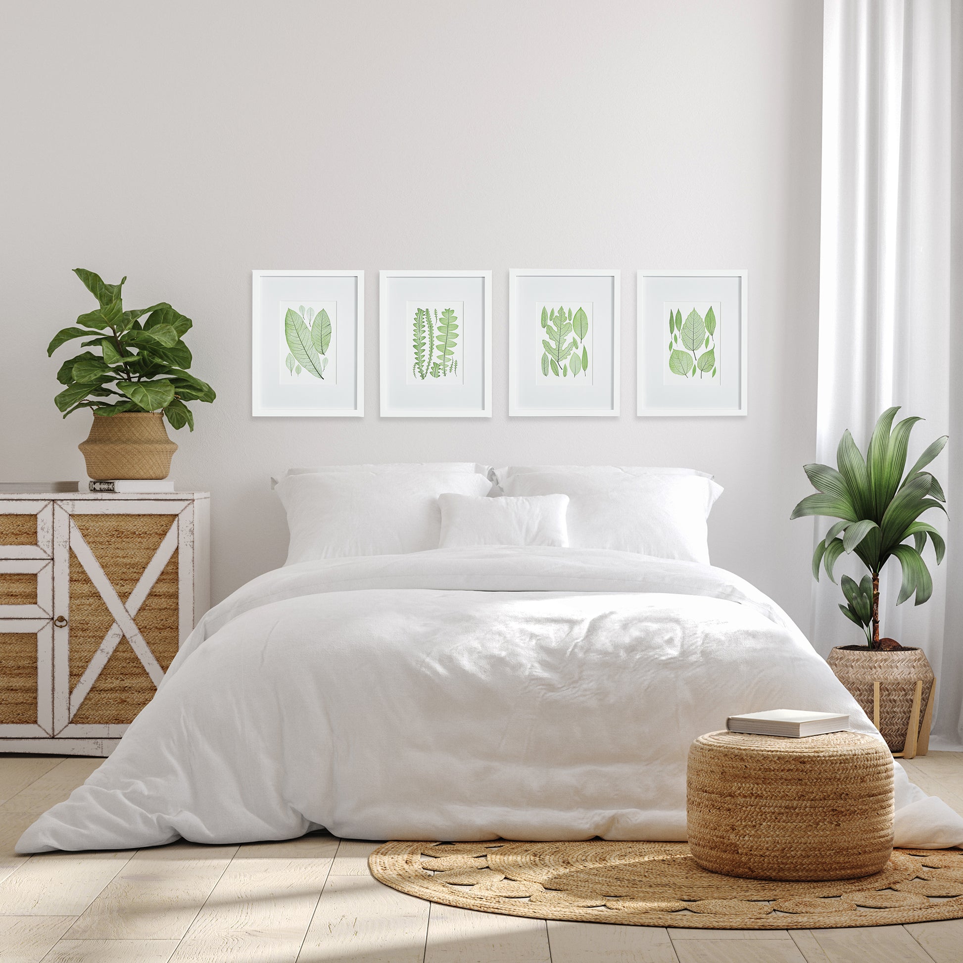 This set of four green leaf prints features a woodcut-style design and white mat, perfect for adding a touch of nature and freshness to any room. The simple frame adds a classic touch, making these prints a charming addition to a powder room or study.