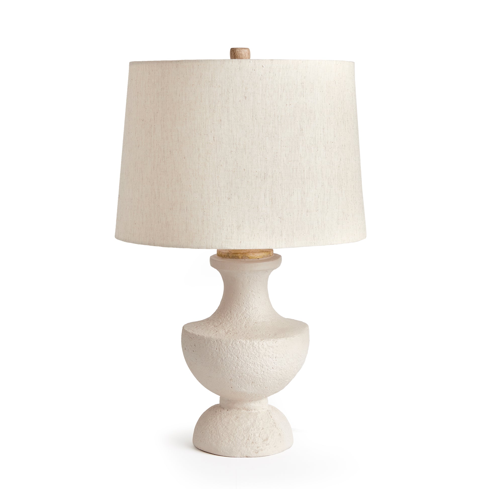 Made of a composite, natural Eco mix, this lamp Base is composed of hardening agents for longevity. The finish is warm white with a pitted texture that shows the composition of the material. With a linen tapered shade and classic silhouette, this petite lamp is perfect for bedside table or desk.