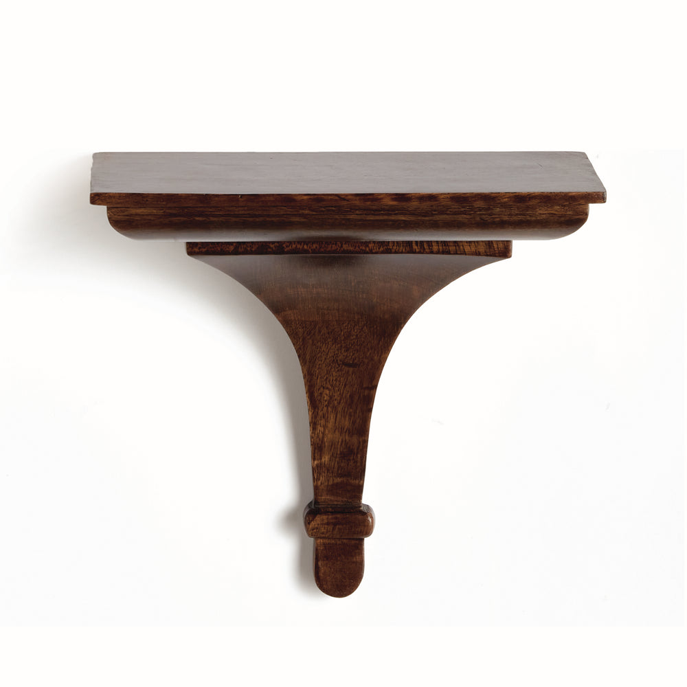 Detail of antique brown mango wood shelf surface showing smooth grain and hand-applied finish in warm brown tone.

