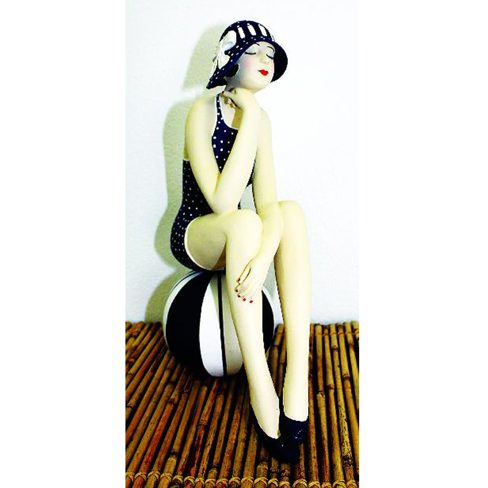 Bathing Beauty Figurine in Navy and White Polka Dot Suit on Ball with Sun Hat
