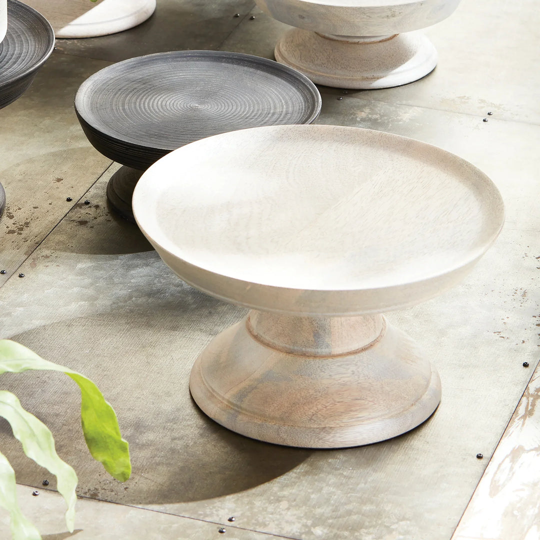 Set of ceramic bowls on a textured surface