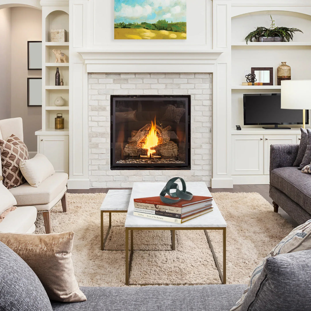 Living room with a fireplace, couches, and a coffee table.