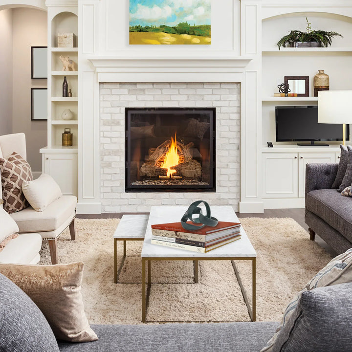 Living room with a fireplace, couches, and a coffee table.