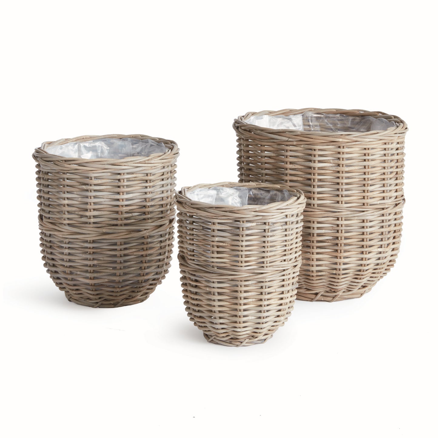 These assorted Gray Woven Basket Planters feature a unique warm gray finish achieved by soaking in mud and drying in the sun. Each planter is lined with plastic to ensure cleanliness and dryness. This set of three large baskets is perfect for coordinating all of your creative planting needs.