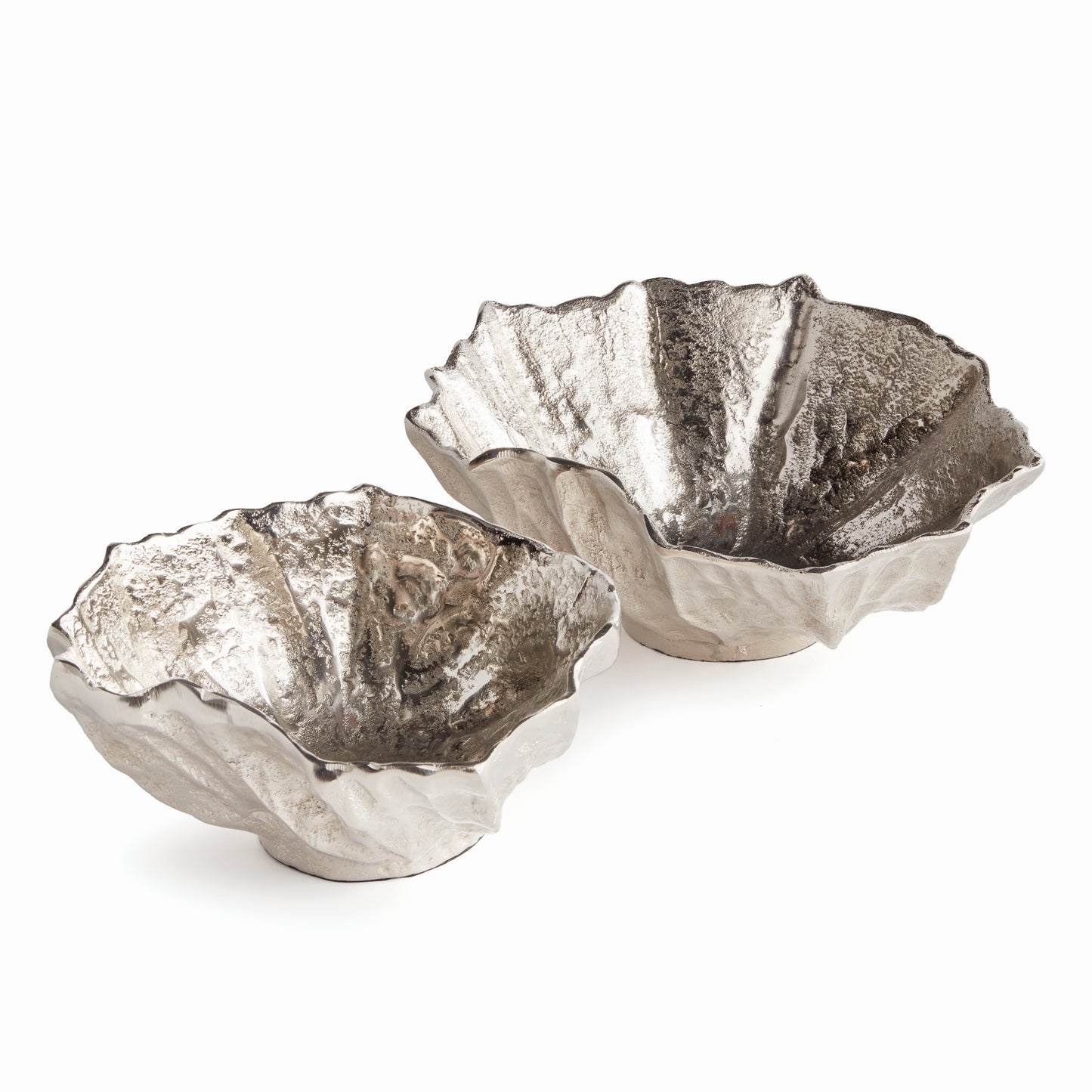 Crafted from durable cast aluminum, these rounded bowls are designed to resemble seashells. This coastal-inspired set can hold natural orbs or be used as beautiful standalone pieces. Perfect for dressing up your ottoman or side table, these Silver Seashell Decorative Bowls are expertly made with precision and inspired by the stunning beauty of coastal seashells.