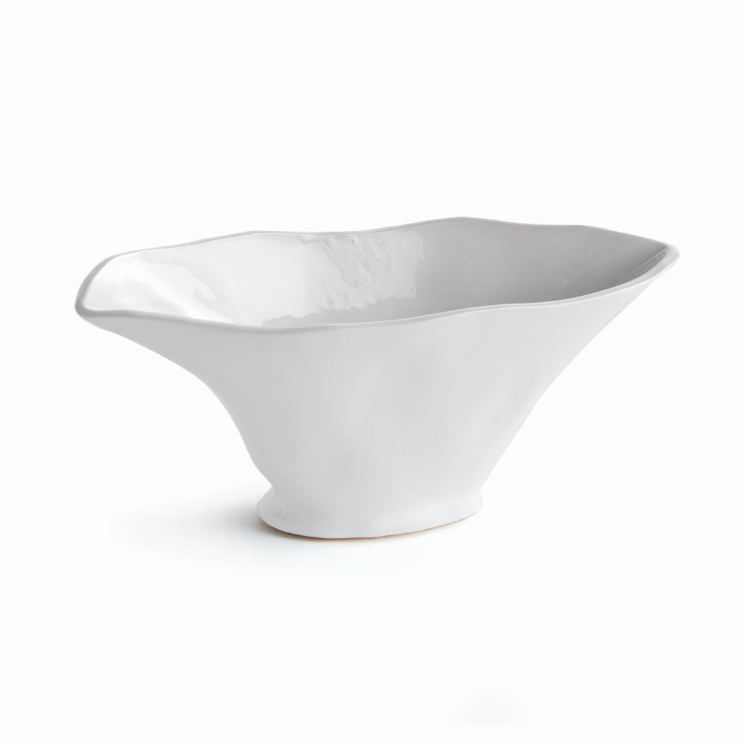 Enhance the aesthetic of any space with this coastal themed white oval vase. Its sculptural form and slim profile are ideal for a narrow console or mantle. Add elegance by draping faux stems or filling it with decorative orbs. Create a unique focal point and elevate your home decor effortlessly.