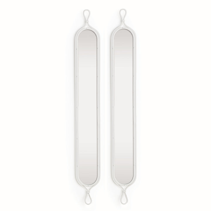 This set of coastal-inspired metal mirrors are vintage in feel, but finished in a crisp white for an unexpected look. Whether a powder room or narrow entryway, this pair is just perfect for those smaller spaces. Elevate your home's interior with a vintage touch of coastal-inspired design. The clean white finish adds a refreshing and unexpected touch, making this set of metal mirrors a must-have for any smaller space in your home.