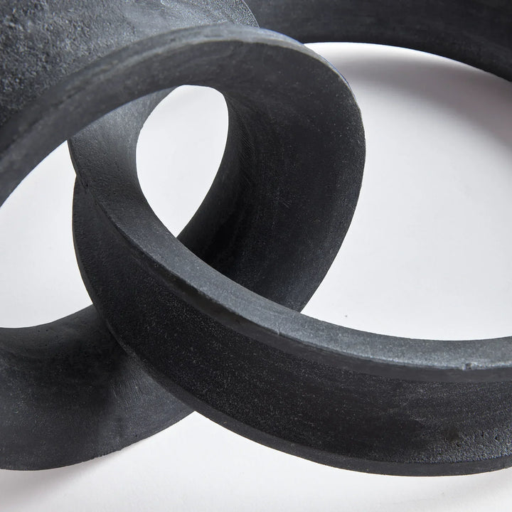 Close-up of black abstract sculptures