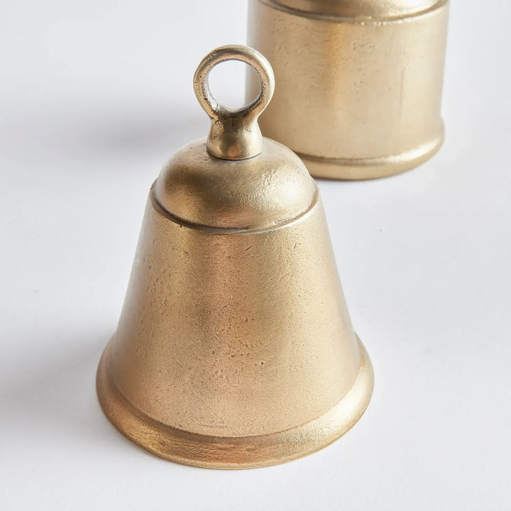 Brass bell on a white background