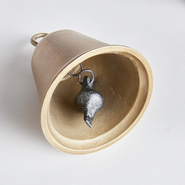Classic gold bell on white background