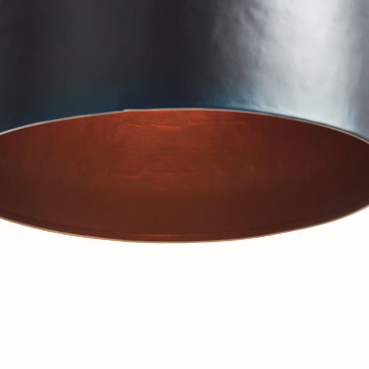 Small Matte Black Pendant Light with Gold Interior for Modern Spaces