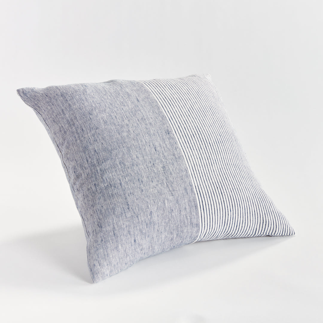 Alternate side angle of navy and ivory striped linen pillow highlighting natural linen texture


