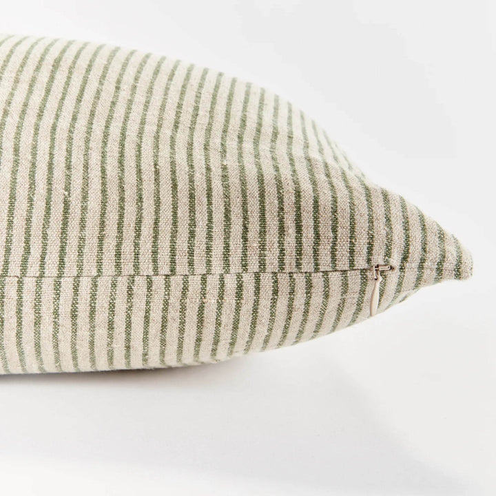 Pinstripe lumbar pillow styled with tonal solids and subtle stripes, showcasing Delamere’s curated mix-and-match aesthetic for elevated, layered design.

