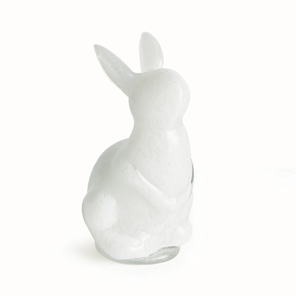 White hand blown glass rabbit sculpture on a white background