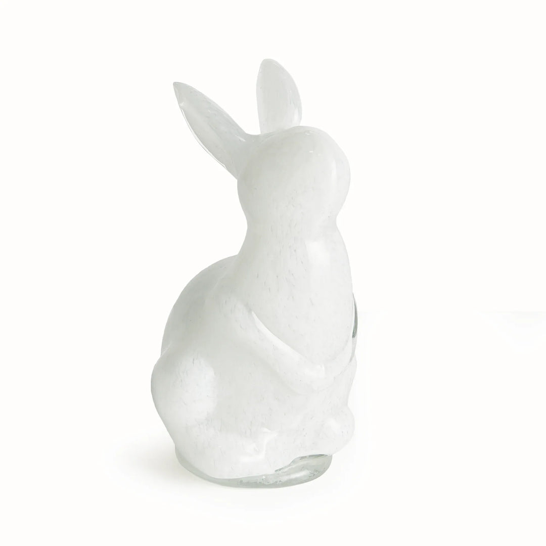 White hand blown glass rabbit sculpture on a white background