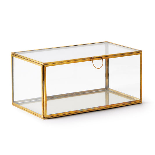 Simple and tailored, this glass and brass box is made to hold your most treasured mementos. A delicate loop handle keeps fingerprints off the glass.