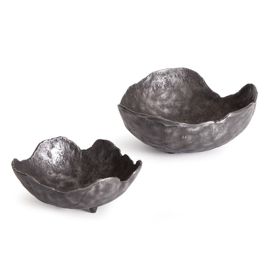 These organic decorative, hand-sculpted bowls are made to be on display. With an oil-rubbed bronze finish and irregular edge, styled or just as they are, a strong statement for the modern space. The epitome of functional art.